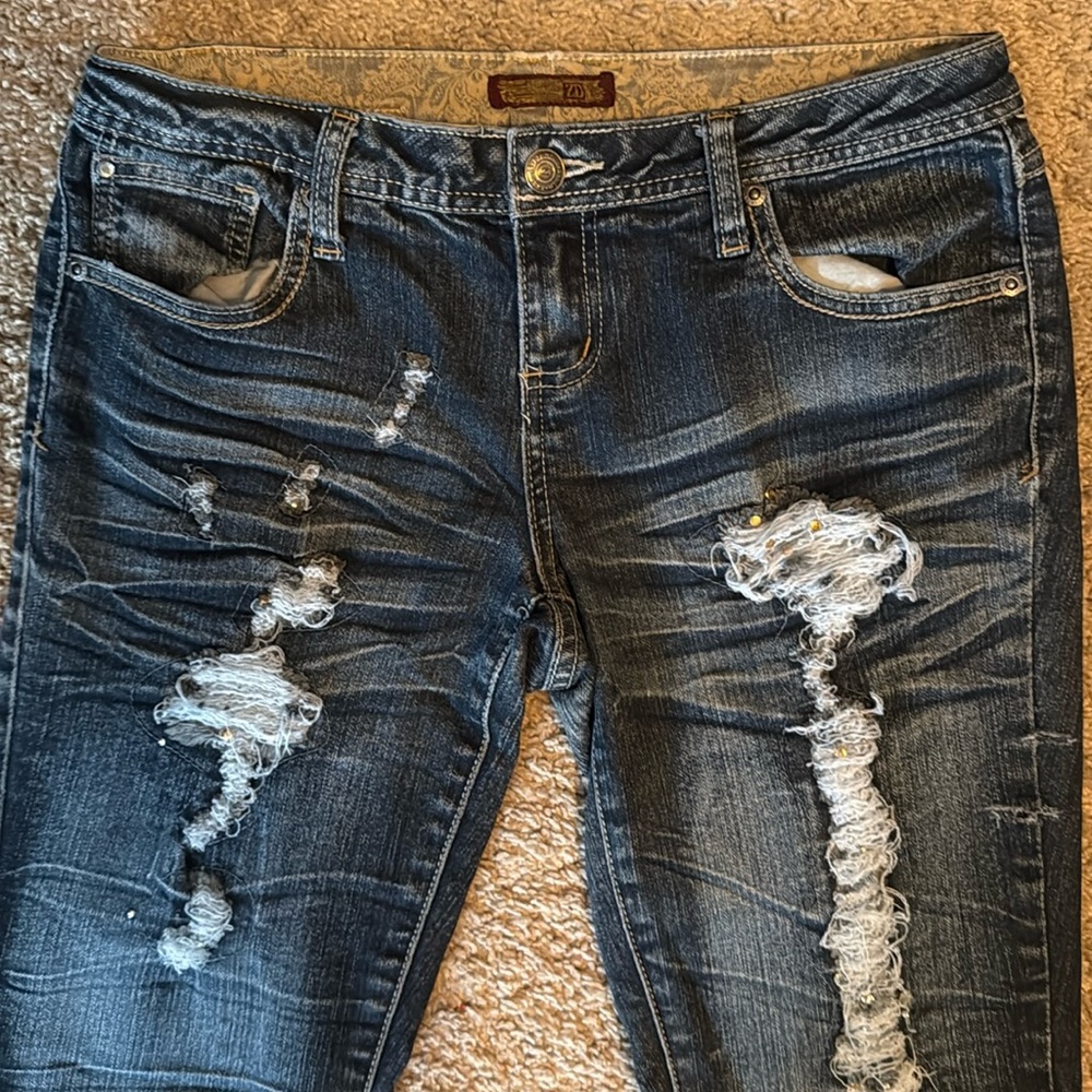 Distressed rutched looking denim w “bead” detail